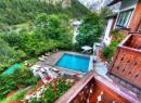 Covered pool and outdoor heated pool c/o Gran Baita Hotel & Wellness